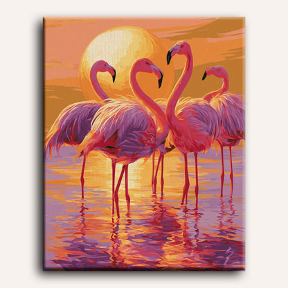 Flamingo trio bij schemering