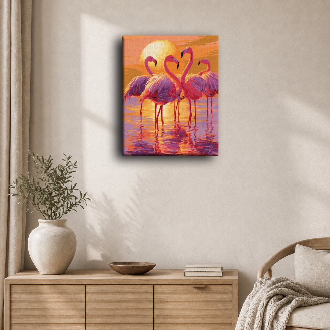 Flamingo trio bij schemering