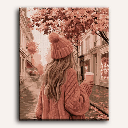 Roze jas in de herfststraat